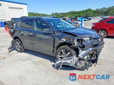 Czwarte zdjęcie samochodu z boku: 2017 TOYOTA RAV4 XLE VIN:2T3WFREV5HW337904 - miniatura