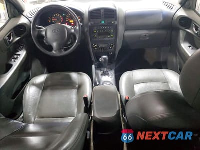 Zdjęcie 8 z 13 samochodu: 2004 HYUNDAI SANTA FE GLS VIN:KM8SC73EX4U595062 - miniatura