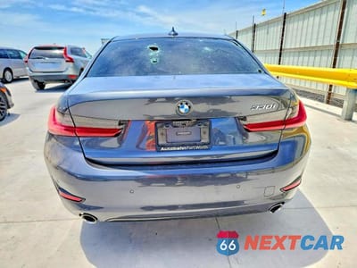 Zdjęcie 6 z 12 samochodu: 2021 BMW 330I VIN:3MW5R1J08M8B53203 - miniatura