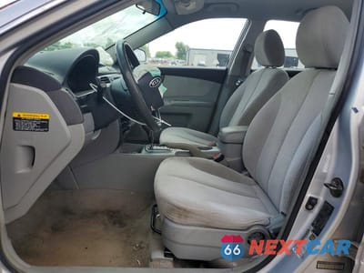 Zdjęcie 7 z 12 samochodu: 2006 KIA OPTIMA LX VIN:KNAGE123965036128 - miniatura