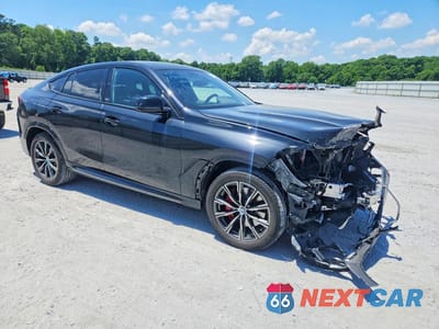 Czwarte zdjęcie samochodu z boku: 2022 BMW X6 XDRIVE40I VIN:5UXCY6C0XN9J04226 - miniatura