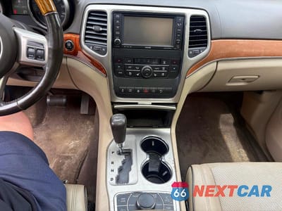 Zdjęcie 9 z 11 samochodu: 2011 JEEP GRAND CHEROKEE OVERLAND VIN:1J4RR6GT8BC605637 - miniatura