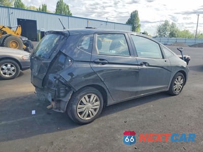 Trzecie zdjęcie samochodu z tyłu: 2016 HONDA FIT LX VIN:JHMGK5H50GX003650 - miniatura