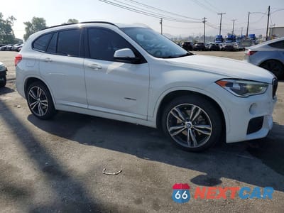Czwarte zdjęcie samochodu z boku: 2018 BMW X1 SDRIVE28I VIN:WBXHU7C39J5H39769 - miniatura