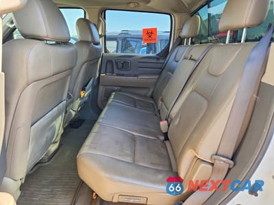 Zdjęcie 10 z 12 samochodu: 2007 HONDA RIDGELINE RTL VIN:2HJYK165X7H522335 - miniatura