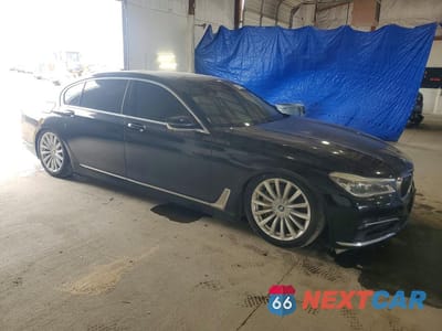 Czwarte zdjęcie samochodu z boku: 2016 BMW 750 I VIN:WBA7F0C50GGL99687 - miniatura