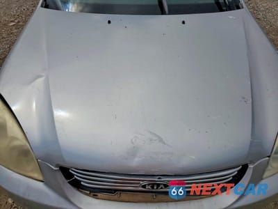 Zdjęcie 11 z 12 samochodu: 2006 KIA OPTIMA LX VIN:KNAGE123965036128 - miniatura