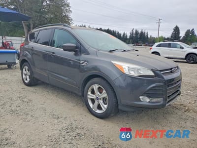 Czwarte zdjęcie samochodu z boku: 2016 FORD ESCAPE SE VIN:1FMCU0G9XGUB60326 - miniatura