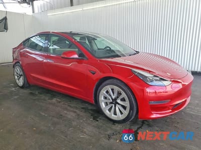 Czwarte zdjęcie samochodu z boku: 2023 TESLA MODEL 3 VIN:5YJ3E1EA8PF435902 - miniatura