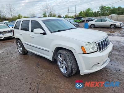 Czwarte zdjęcie samochodu z boku: 2007 JEEP GRAND CHEROKEE SRT-8 VIN:1J8HR78337C502728 - miniatura