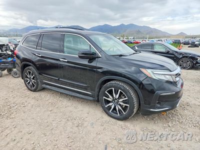 Czwarte zdjęcie samochodu z boku: 2019 HONDA PILOT TOURING VIN:5FNYF6H65KB003171 - miniatura