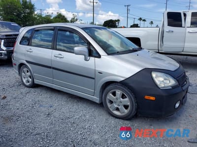 Czwarte zdjęcie samochodu z boku: 2003 SUZUKI AERIO SX VIN:JS2RC41HX35203162 - miniatura
