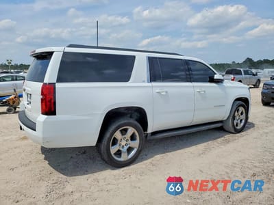Trzecie zdjęcie samochodu z tyłu: 2020 CHEVROLET SUBURBAN C1500 LT VIN:1GNSCHKCXLR124032 - miniatura