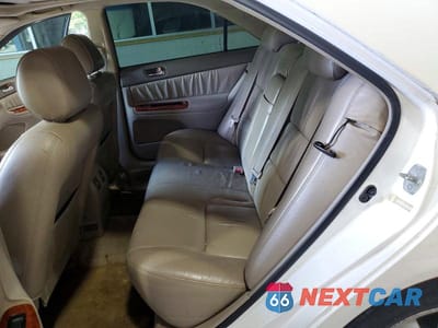 Zdjęcie 10 z 12 samochodu: 2003 TOYOTA CAMRY XLE V6 VIN:JTDBF30K430112363 - miniatura