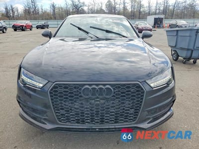 Piąte zdjęcie samochodu w środku: 2016 AUDI A7 PREMIUM PLUS VIN:WAUWGAFC7GN078931 - miniatura