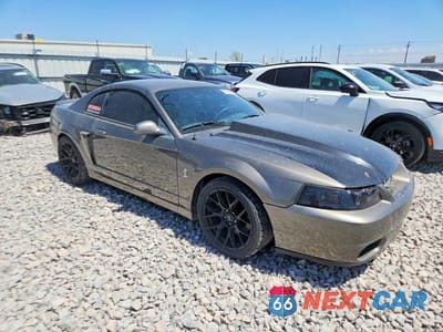 Czwarte zdjęcie samochodu z boku: 2003 FORD MUSTANG COBRA SVT VIN:1FAFP48Y93F300084 - miniatura
