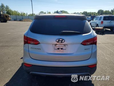 Zdjęcie 6 z 12 samochodu: 2014 HYUNDAI SANTA FE SPORT 2.4L VIN:5XYZU3LB9EG158039 - miniatura