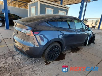 Trzecie zdjęcie samochodu z tyłu: 2022 TESLA MODEL Y VIN:7SAYGDEE4NF411469 - miniatura