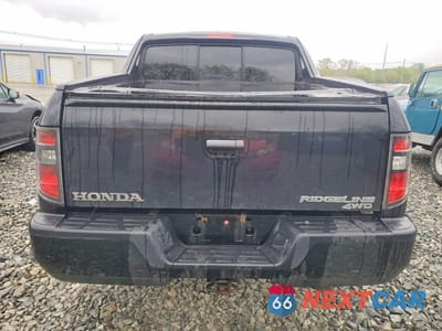 Zdjęcie 6 z 13 samochodu: 2013 HONDA RIDGELINE SPORT VIN:5FPYK1F70DB015541 - miniatura