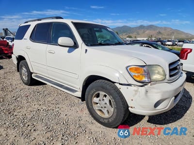 Czwarte zdjęcie samochodu z boku: 2001 TOYOTA SEQUOIA LIMITED VIN:5TDBT48A71S038098 - miniatura