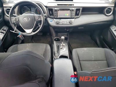 Zdjęcie 8 z 13 samochodu: 2016 TOYOTA RAV4 HV XLE VIN:JTMRJREV1GD042032 - miniatura