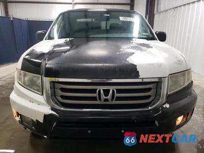 Piąte zdjęcie samochodu w środku: 2013 HONDA RIDGELINE RTL VIN:5FPYK1F55DB012701 - miniatura