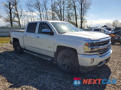 Czwarte zdjęcie samochodu z boku: 2017 CHEVROLET SILVERADO K1500 HIGH COUNTRY VIN:3GCUKTEJXHG204973 - miniatura