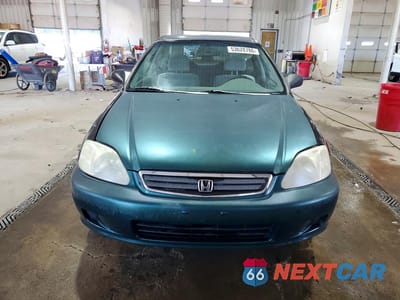 Piąte zdjęcie samochodu w środku: 1999 HONDA CIVIC LX VIN:2HGEJ6673XH555901 - miniatura