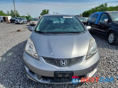 Piąte zdjęcie samochodu w środku: 2010 HONDA FIT SPORT VIN:JHMGE8H4XAS015535 - miniatura
