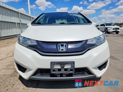 Piąte zdjęcie samochodu w środku: 2015 HONDA FIT LX VIN:3HGGK5G57FM768587 - miniatura