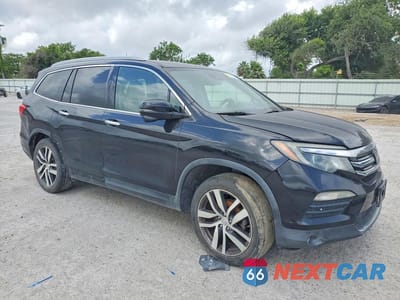 Czwarte zdjęcie samochodu z boku: 2016 HONDA PILOT TOURING VIN:5FNYF6H99GB115148 - miniatura
