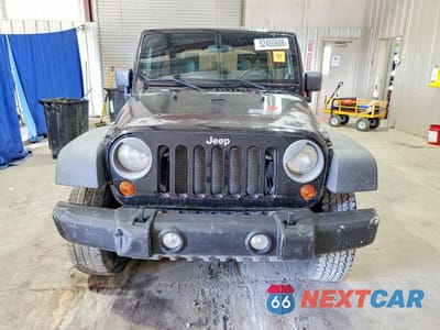 Piąte zdjęcie samochodu w środku: 2010 JEEP WRANGLER UNLIMITED SPORT VIN:1J4BA3H19AL194221 - miniatura