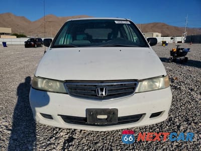 Piąte zdjęcie samochodu w środku: 2002 HONDA ODYSSEY LX VIN:5FNRL18592B048041 - miniatura