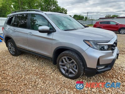 Czwarte zdjęcie samochodu z boku: 2022 HONDA PASSPORT EXL VIN:5FNYF8H54NB031566 - miniatura