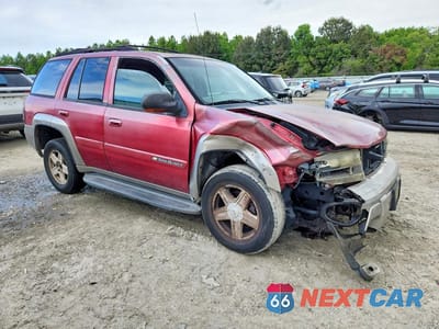 Czwarte zdjęcie samochodu z boku: 2002 CHEVROLET TRAILBLAZER XL VIN:1GNDS13S422236065 - miniatura