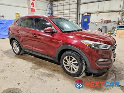 Czwarte zdjęcie samochodu z boku: 2016 HYUNDAI TUCSON SE VIN:KM8J33A47GU035910 - miniatura