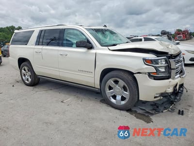 Czwarte zdjęcie samochodu z boku: 2015 CHEVROLET SUBURBAN K1500 LTZ VIN:1GNSKKKC1FR156825 - miniatura