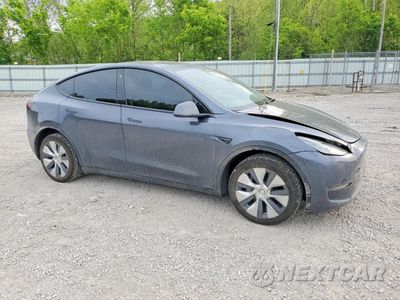 Czwarte zdjęcie samochodu z boku: 2023 TESLA MODEL Y VIN:7SAYGDEE1PF604858 - miniatura