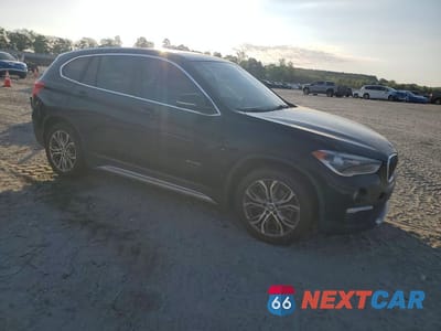 Czwarte zdjęcie samochodu z boku: 2018 BMW X1 XDRIVE28I VIN:WBXHT3C34J5F92921 - miniatura