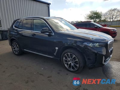 Czwarte zdjęcie samochodu z boku: 2026 BMW X5 XDRIVE40I VIN:5UX23EU01T9103014 - miniatura