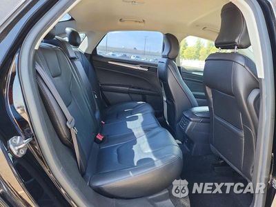 Zdjęcie 10 z 13 samochodu: 2016 FORD FUSION TITANIUM PHEV VIN:3FA6P0SU1GR229566 - miniatura