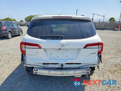 Zdjęcie 6 z 14 samochodu: 2022 HONDA PILOT TOURING VIN:5FNYF5H63NB023983 - miniatura