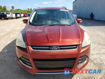 Piąte zdjęcie samochodu w środku: 2016 FORD ESCAPE TITANIUM VIN:1FMCU0JX3GUB97435 - miniatura