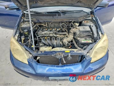 Zdjęcie 11 z 12 samochodu: 2006 TOYOTA COROLLA MATRIX XR VIN:2T1KR32E46C588699 - miniatura