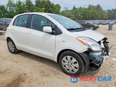 Czwarte zdjęcie samochodu z boku: 2010 TOYOTA YARIS BASE VIN:JTDKT4K38A5308617 - miniatura