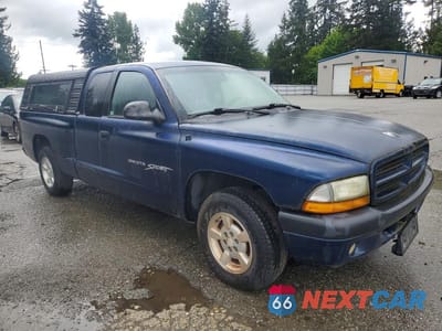 Czwarte zdjęcie samochodu z boku: 2001 DODGE DAKOTA VIN:1B7GL22X91S287551 - miniatura