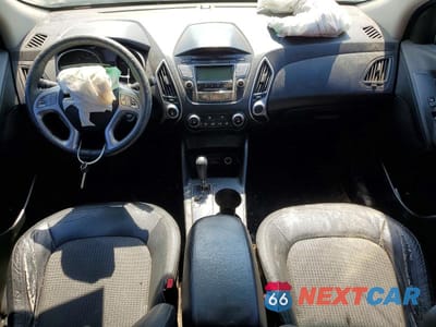 Zdjęcie 8 z 12 samochodu: 2012 HYUNDAI TUCSON GLS VIN:KM8JU3AC4CU537112 - miniatura
