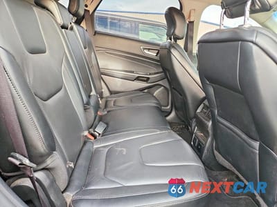 Zdjęcie 11 z 13 samochodu: 2019 FORD EDGE TITANIUM VIN:2FMPK3K97KBC69096 - miniatura