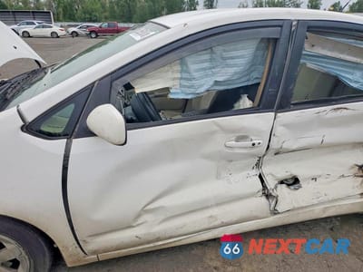 Zdjęcie 7 z 12 samochodu: 2005 TOYOTA PRIUS BASE VIN:JTDKB20UX53087087 - miniatura