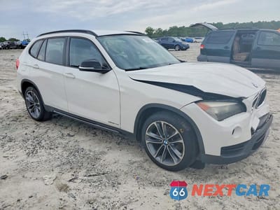 Czwarte zdjęcie samochodu z boku: 2014 BMW X1 SDRIVE28I VIN:WBAVM1C52EVW51922 - miniatura